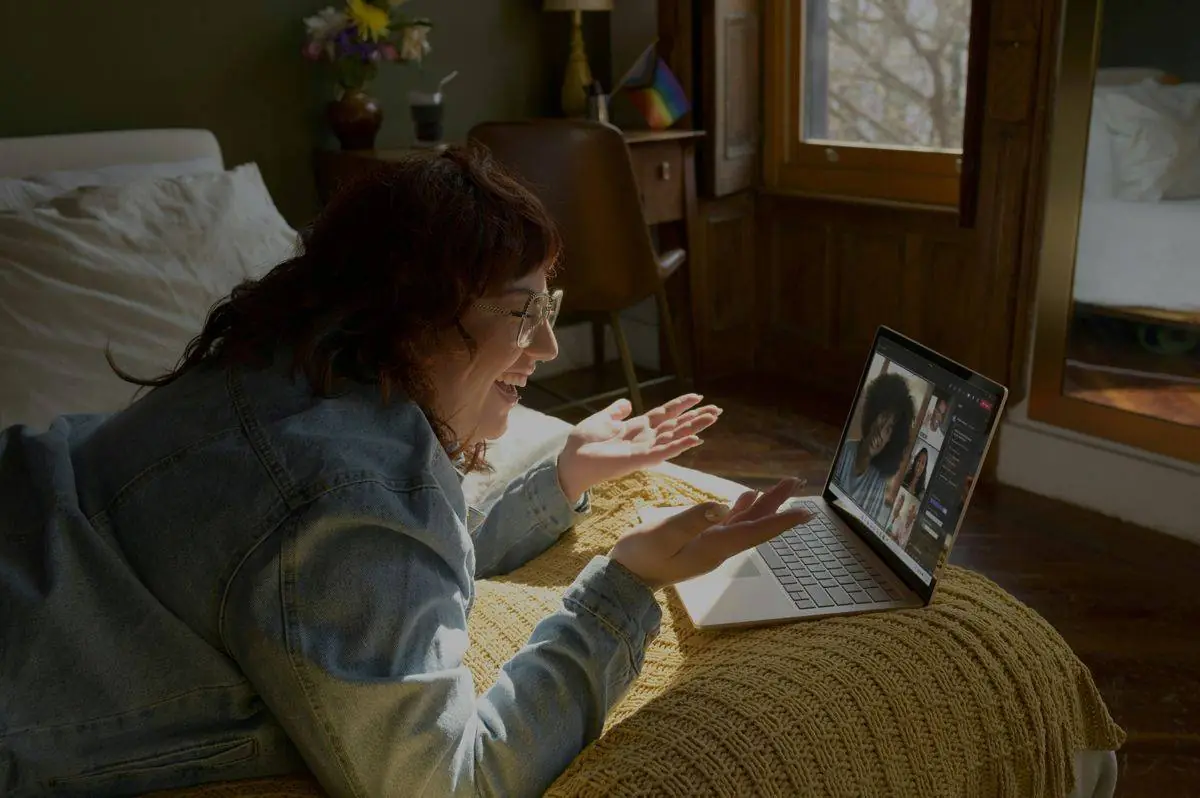 A person in an online therapy session at home